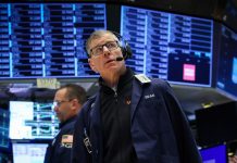 futures-fall-as-middle-east-tensions-simmer,-netflix-slumps